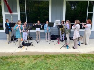 Members of the Flute Choir playing out in the community.